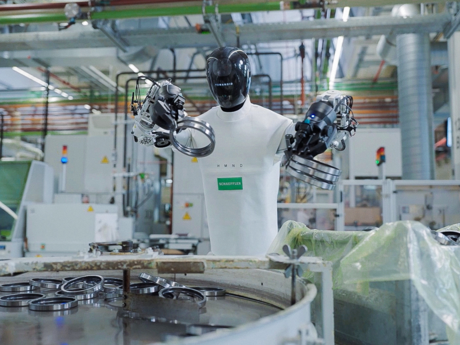 A HMND 01 robot in an industrial setting in an archival Humanoid photograph