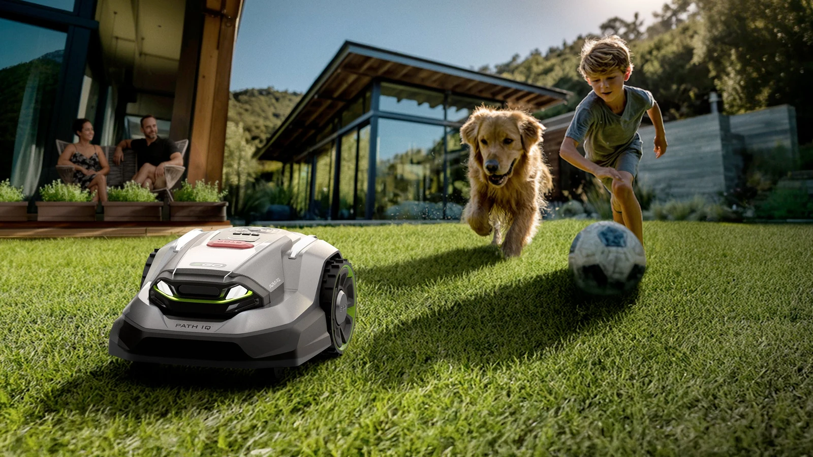 Official EGO image showing an AURA-R2 mower with PATH IQ operating on a lawn. Source: EGO.