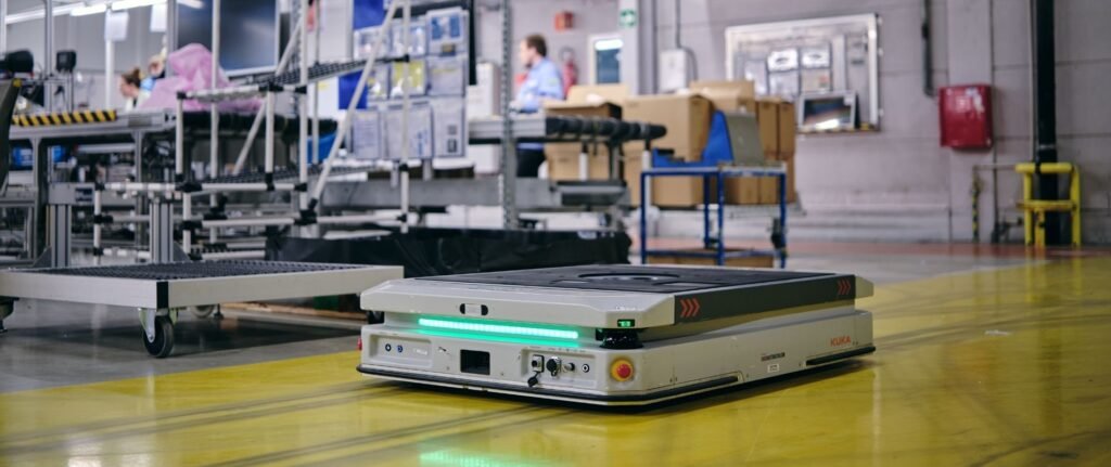 KUKA KMP 1500P autonomously transporting material in an industrial environment