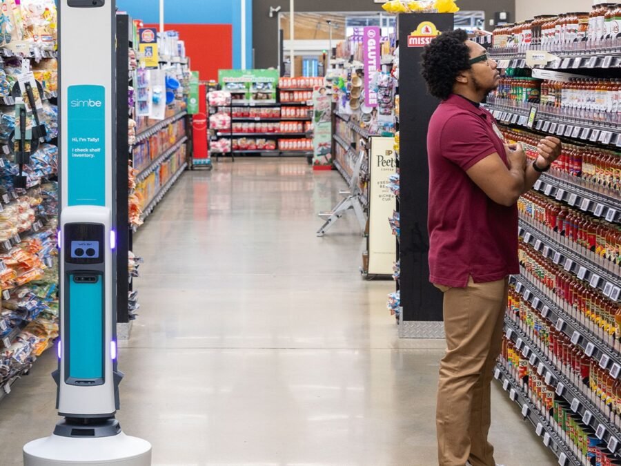 Simbe Tally robot operating in a grocery-store aisle