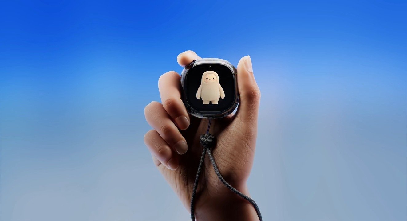 Meta Muse Charm showing the Muse avatar, held in a hand against a blue background
