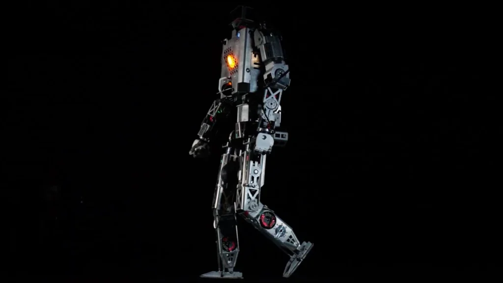 The Minerva Roger humanoid prototype walking in a manufacturer press photograph