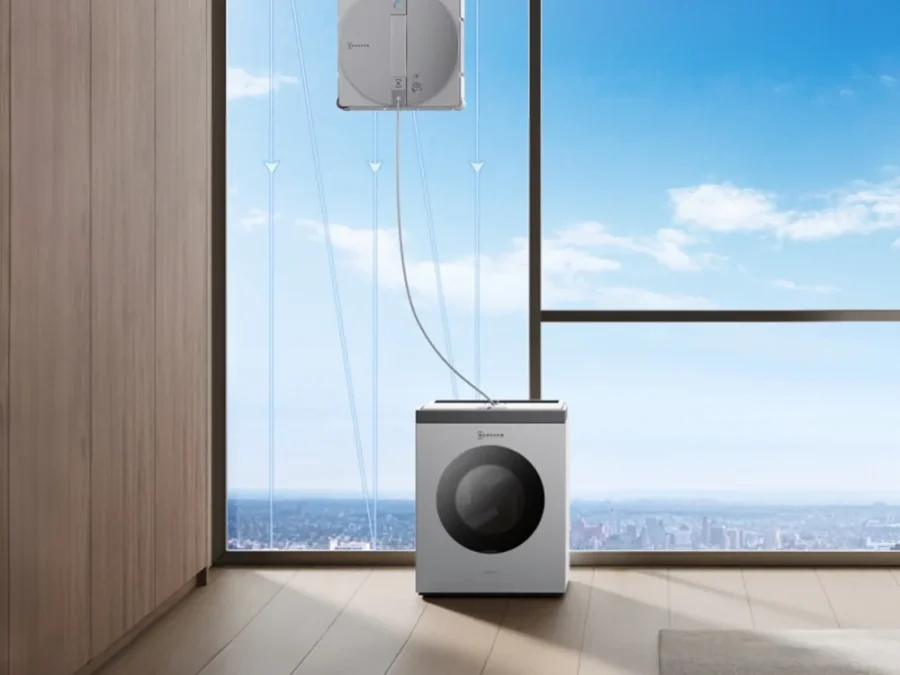 ECOVACS WINBOT W3 OMNI by a large vertical window